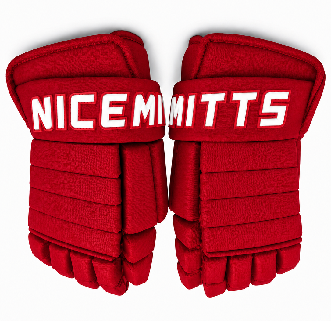 A pair of all red Classic 4 Roll Nicemitts hockey gloves with white logos on a white background.