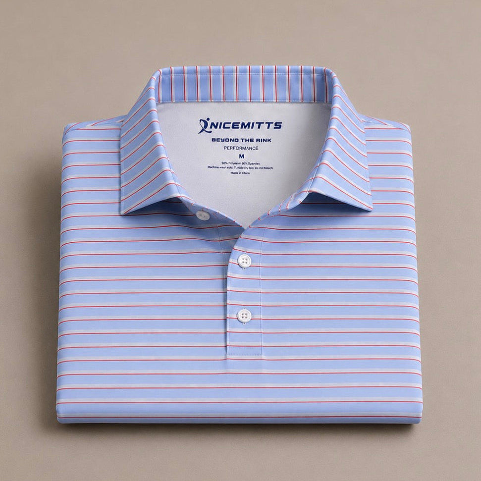 A folded mens premium blue red and white striped performance polo by nicemitts on a tan background.