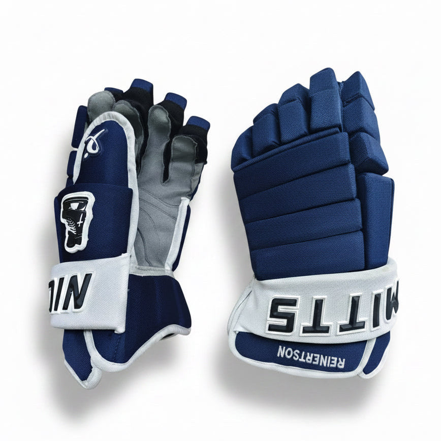 A pair of hockey gloves shown against a plain white background, displaying both the backhand and palm views. The gloves are navy blue with white cuffs and gray palms.